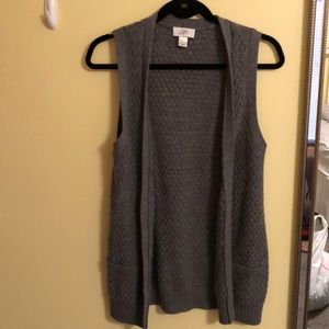 grey sleeveless sweater with buttons
